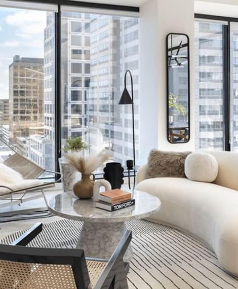 A chic, well-appointed high-rise apartment interior, showcasing the type of residential space maintained by Omega Maintenance Solutions